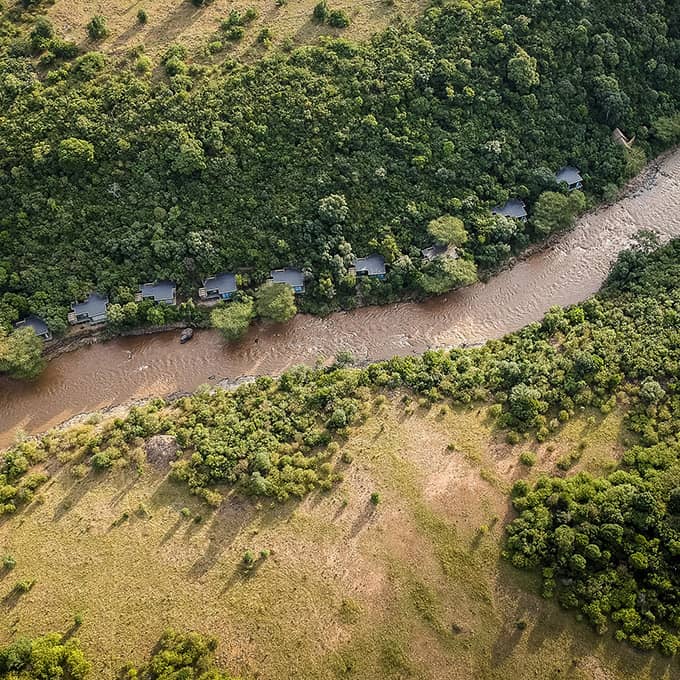 Aerial view of Sanctuary Olonana Lodge and the Mara River