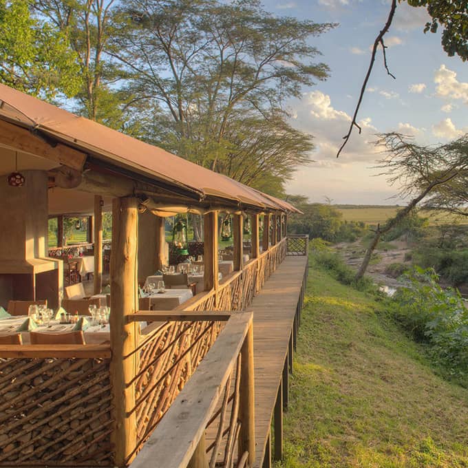 The restaurant at Basecamp MasaiMara overlooking the Talek River