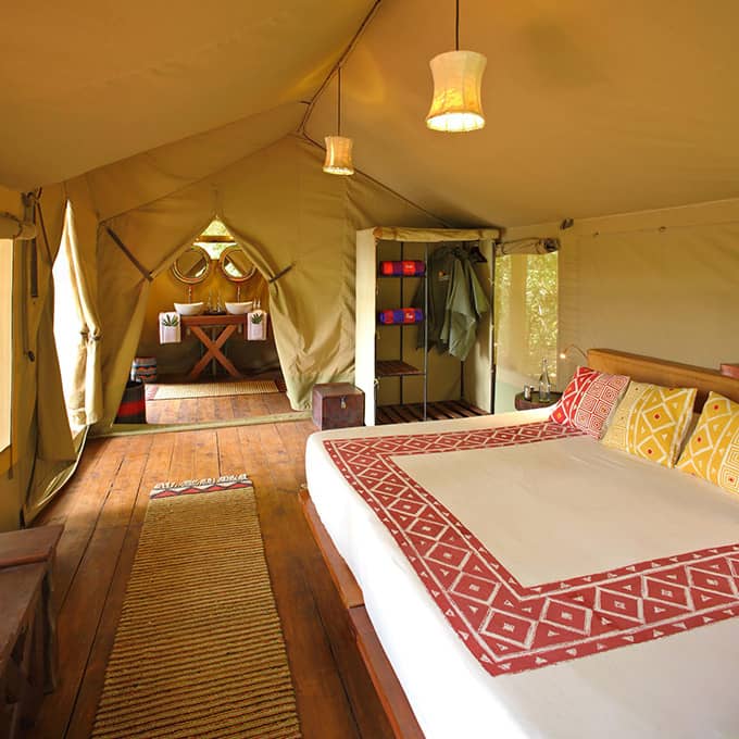Tented bedroom at Basecamp Mara