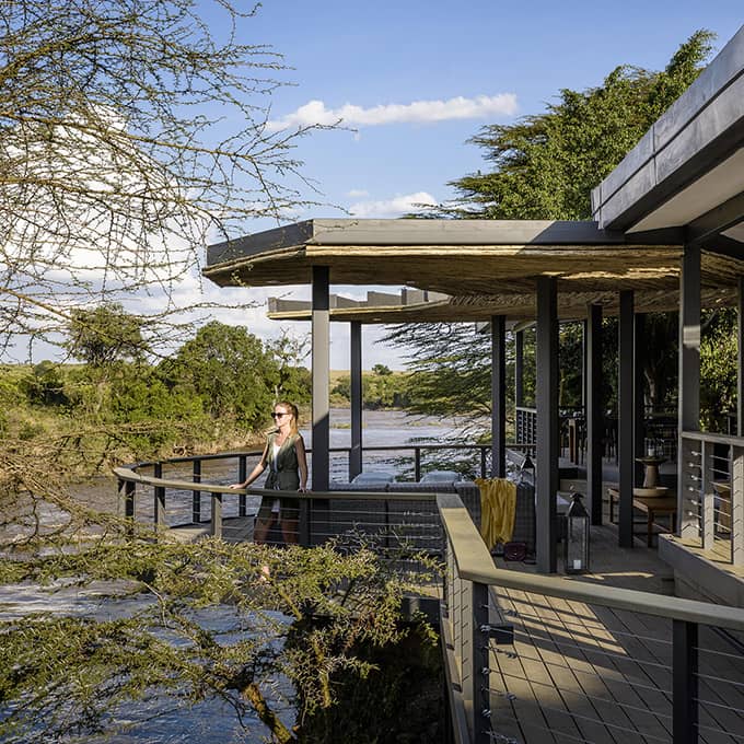 The deck at Olonana Lodge offers views over the iconic Mara River