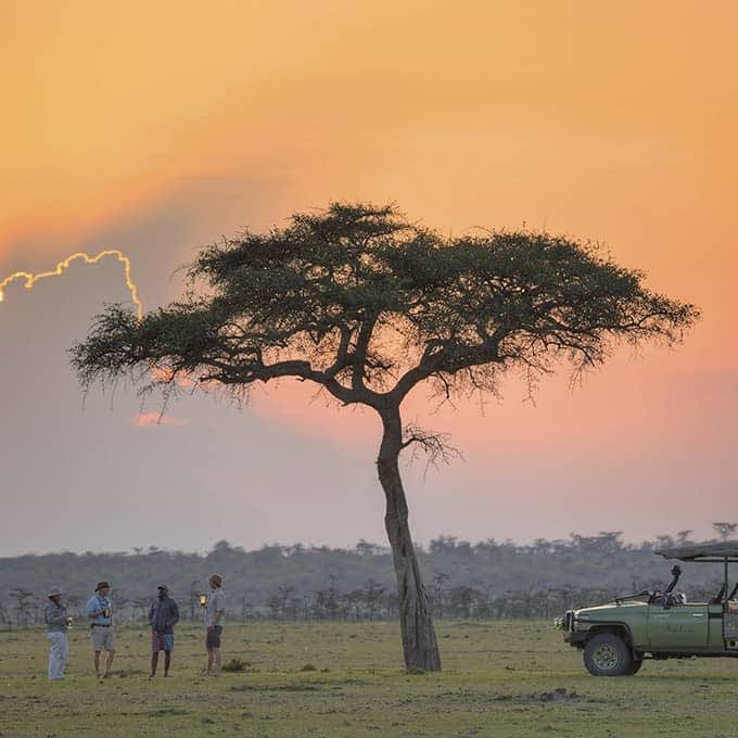 Masai Mara sunset drinks in Naboisho Conservancy