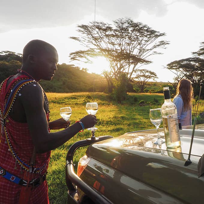 Enjoy a sundowner whilst on safari at Basecamp Eagle View in Kenya